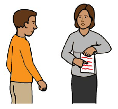 A person pointing out part of a document to another person.